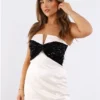 The Frolic Ivory / Black Sequin Bow Mini Dress